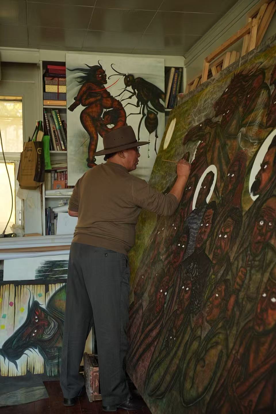 Awangzhaba painting in his studio